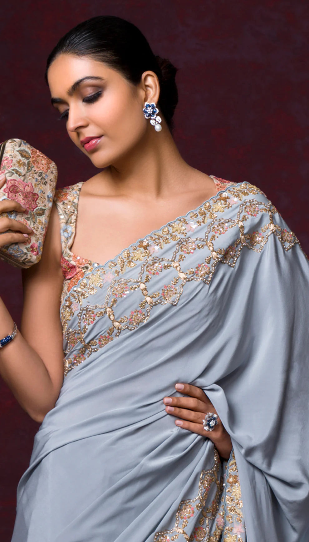 A Perfectly Crafted Powder Blue Crepe Silk Saree